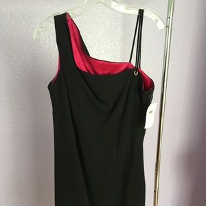 Black cocktail dress with grommet detail